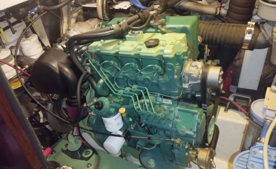 A Volvo Penta D2-75 in a boat engine room